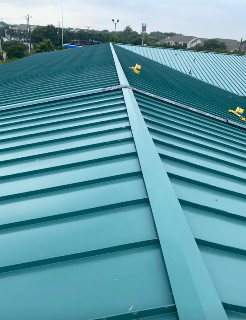 Green commercial metal roof ridge and valley for Metal Roof Repair in Collier